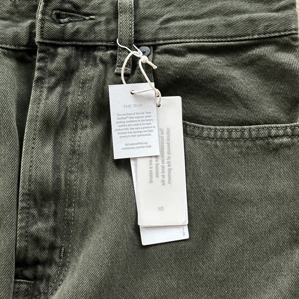 High-rise Outerknown jeans. Color is “pine”